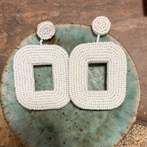 White beaded earrings